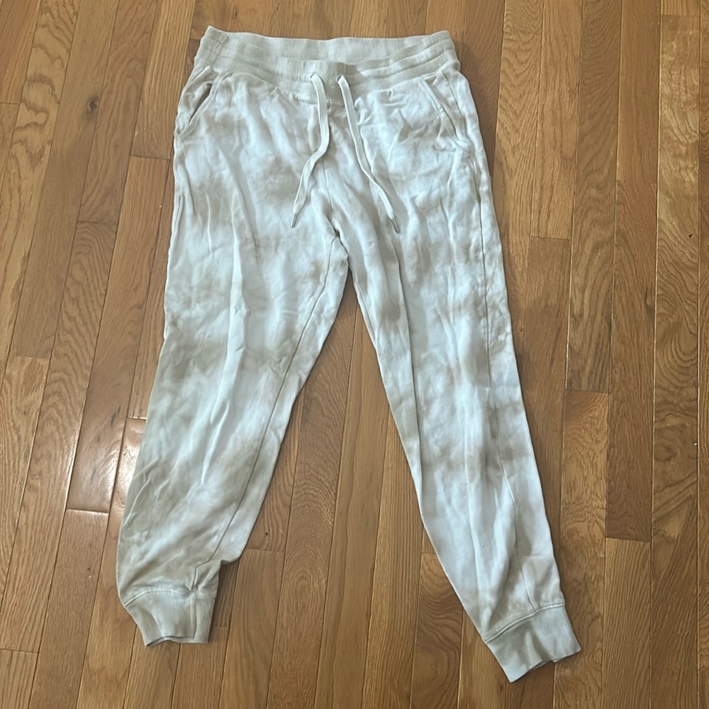 tie-dye light brown and cream-ish joggers
